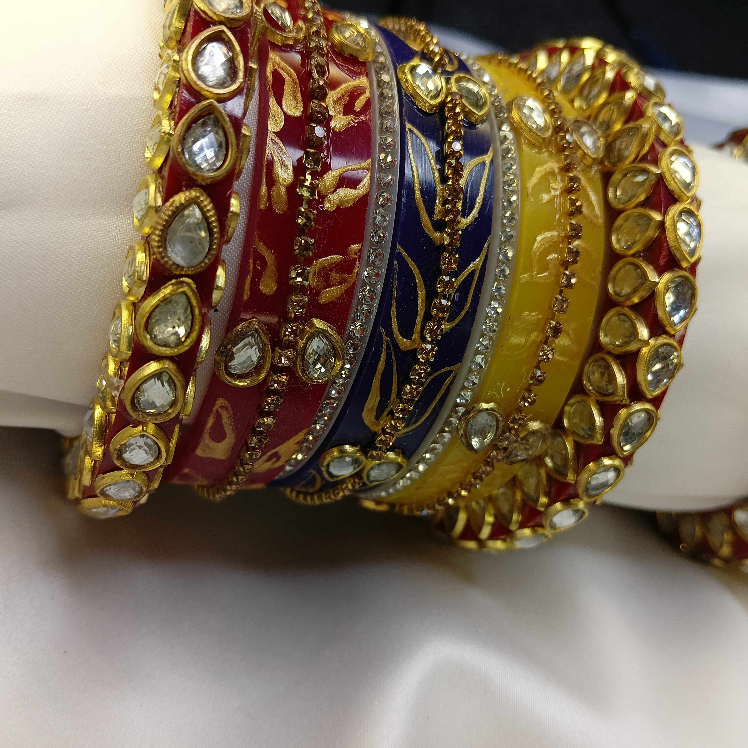 Buy Trendy Leaf Pattern Bridal Chuda Set Online – Red Yellow Blue Designer Bangles for Women by Zakreen