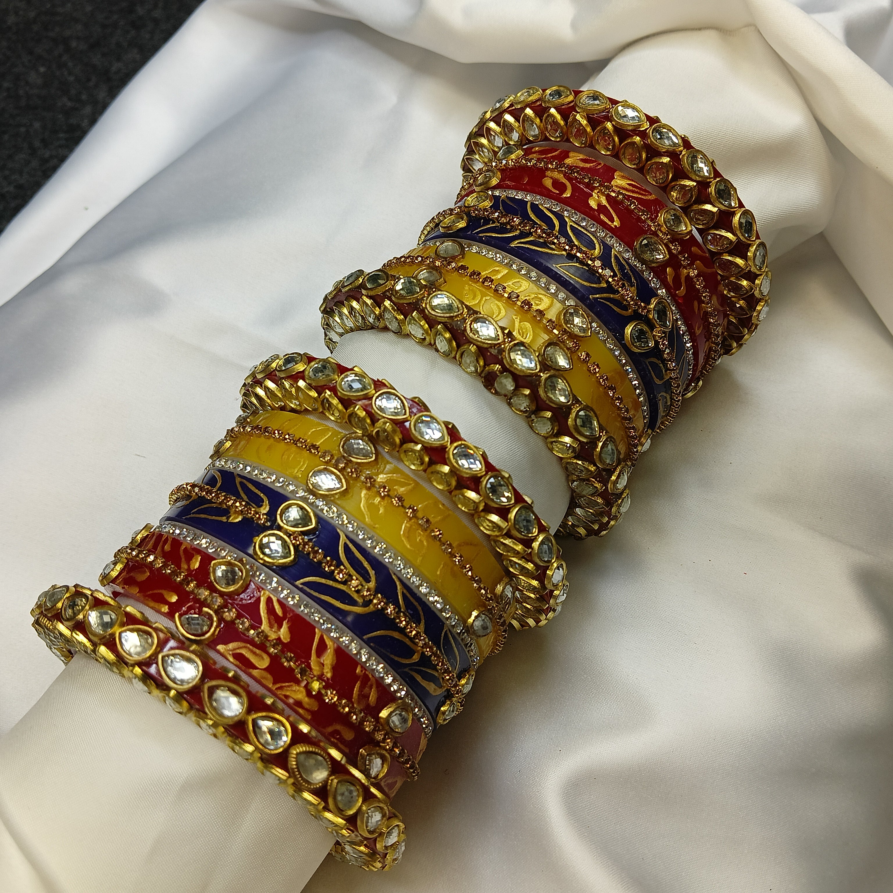 Buy Trendy Leaf Pattern Bridal Chuda Set Online – Red Yellow Blue Designer Bangles for Women by Zakreen