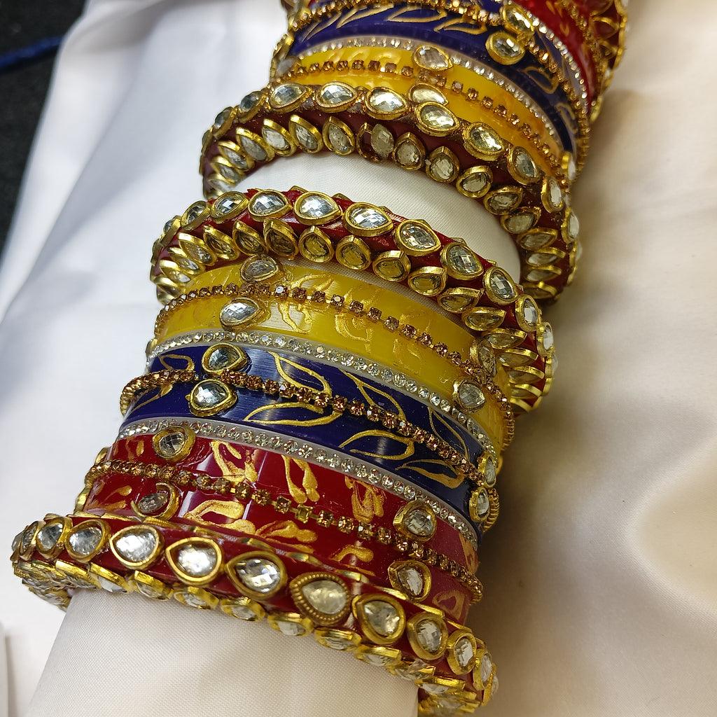 Buy Trendy Leaf Pattern Bridal Chuda Set Online – Red Yellow Blue Designer Bangles for Women by Zakreen