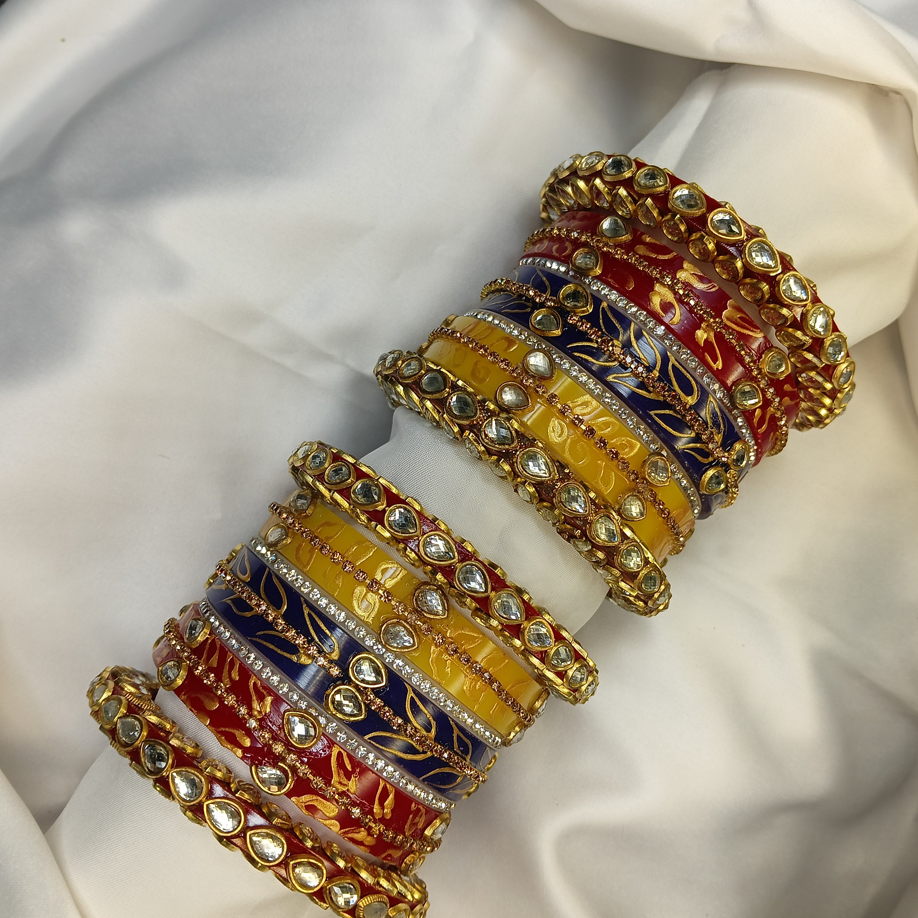 Buy Trendy Leaf Pattern Bridal Chuda Set Online – Red Yellow Blue Designer Bangles for Women by Zakreen