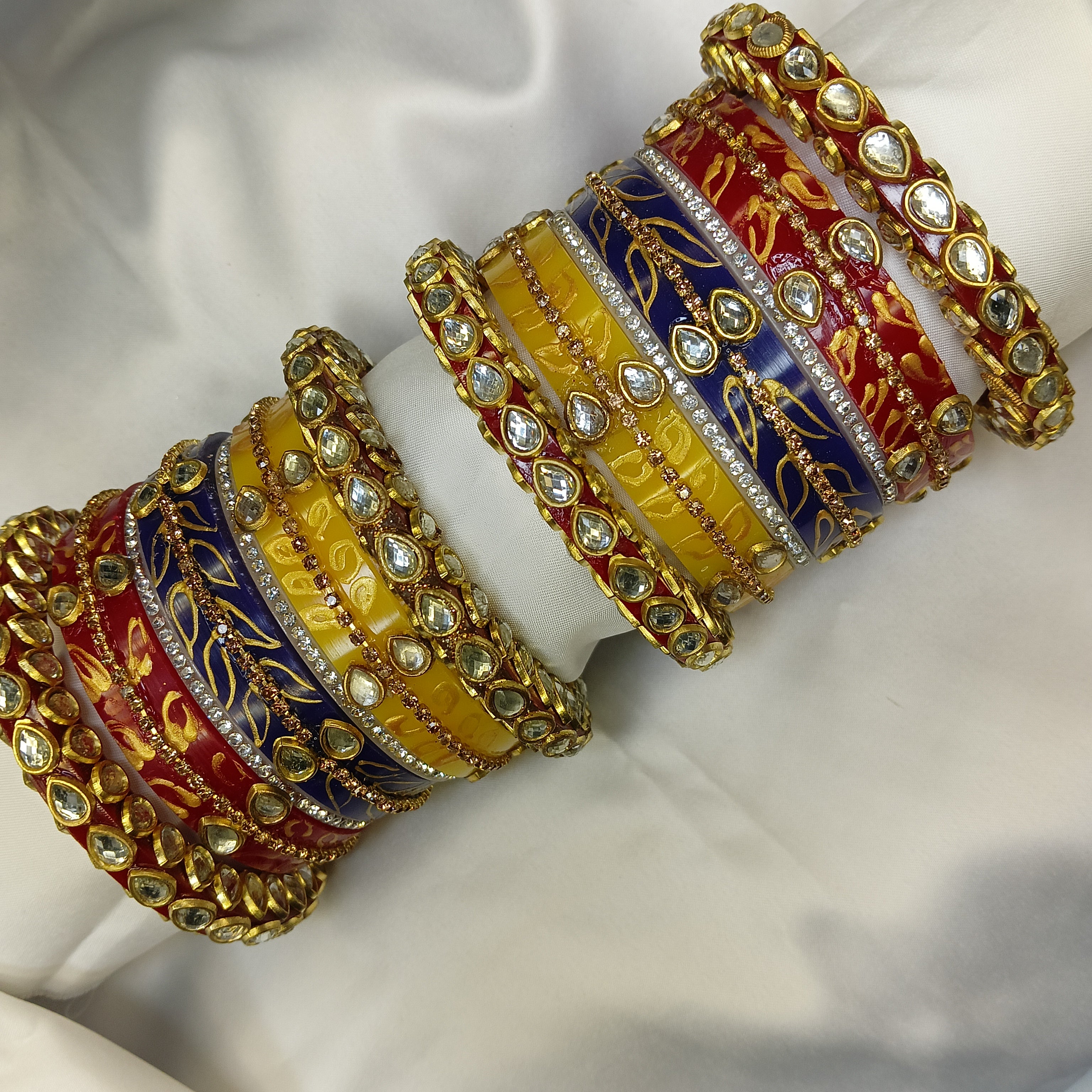 Buy Trendy Leaf Pattern Bridal Chuda Set Online – Red Yellow Blue Designer Bangles for Women by Zakreen
