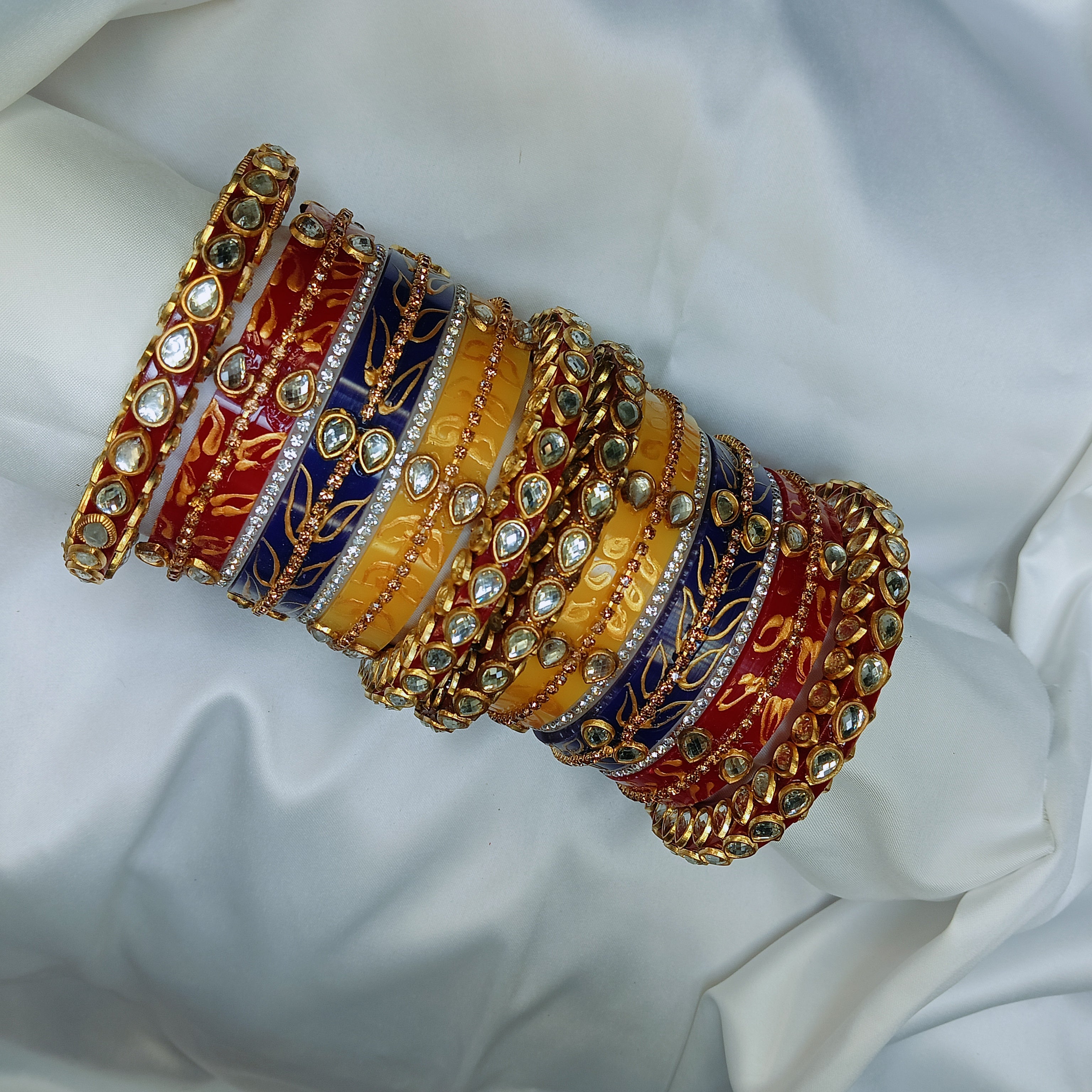Buy Trendy Leaf Pattern Bridal Chuda Set Online – Red Yellow Blue Designer Bangles for Women by Zakreen