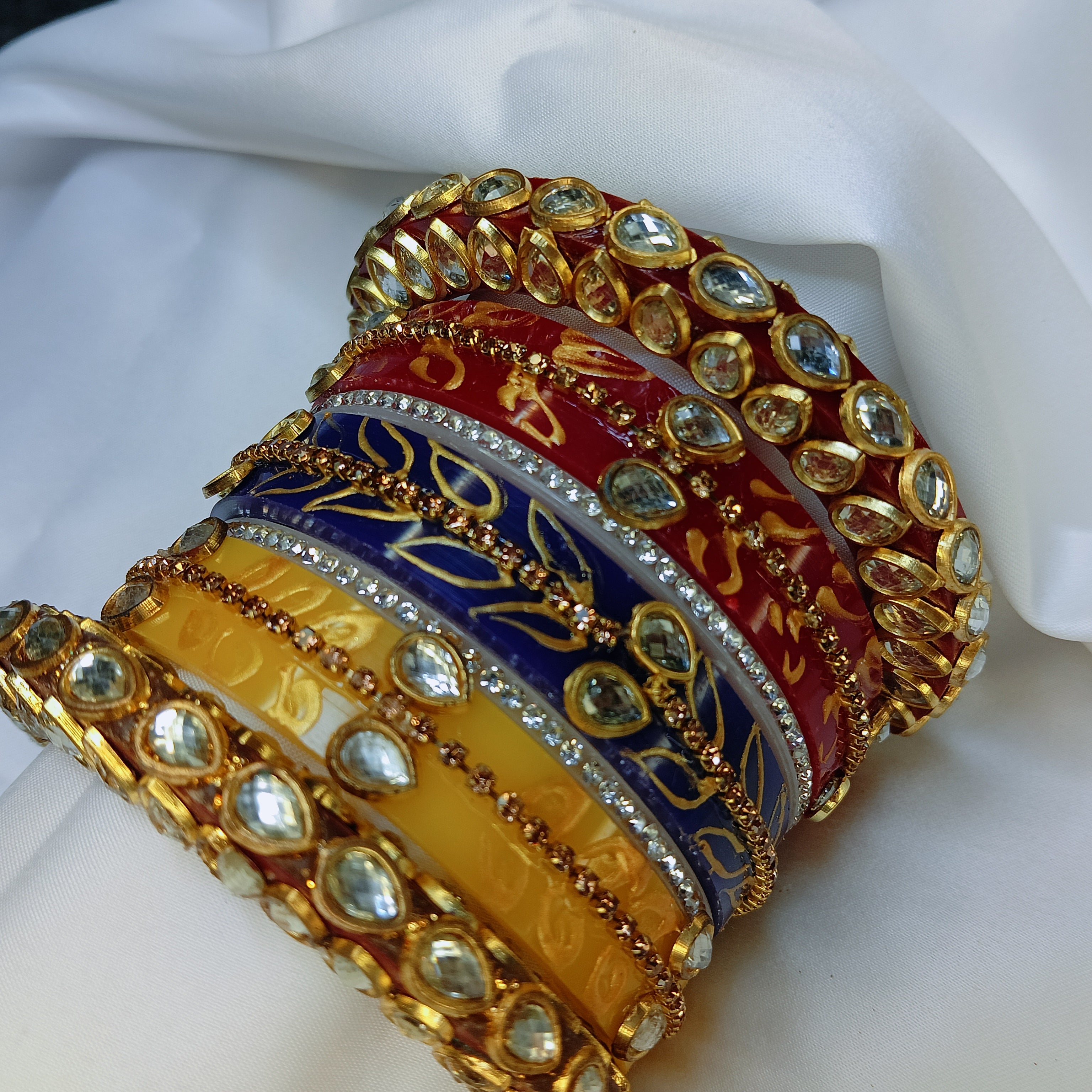 Buy Trendy Leaf Pattern Bridal Chuda Set Online – Red Yellow Blue Designer Bangles for Women by Zakreen